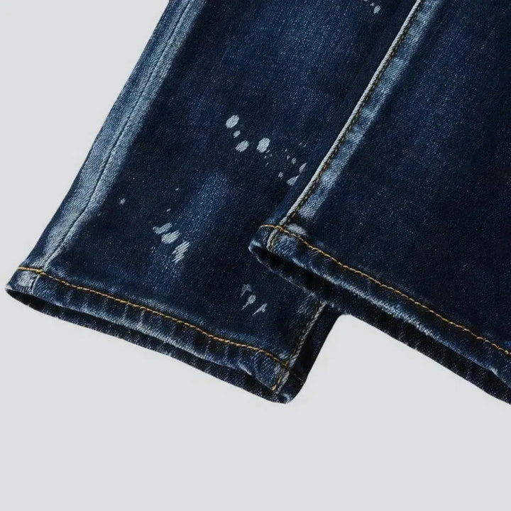 Dark-wash men's grunge jeans