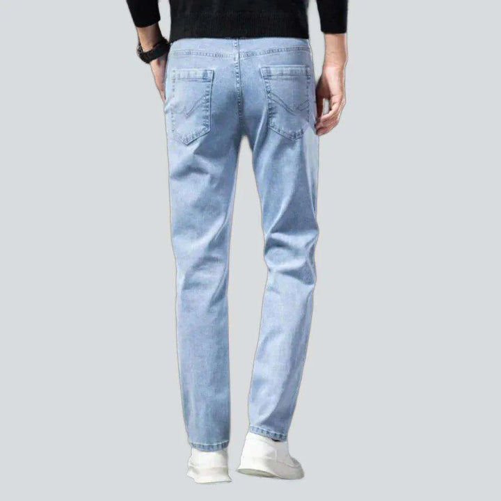 Diagonal pocket sanded men's jeans
